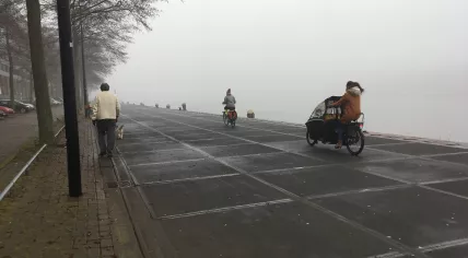 Fog obscures the view of Amsterdam Central Station, 3 March 2021