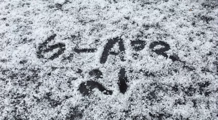 A sign in snow in Amsterdam. 6 Apr 2021.