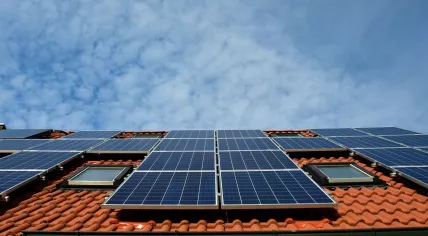 Solar panels cover a rooftop in an unnamed location. November 2017