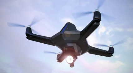Drone flying over clouds