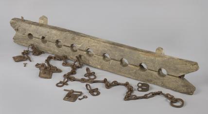 A tronco, the multiple foot stocks used for restraining enslaved people from the 17th through 19th centuries