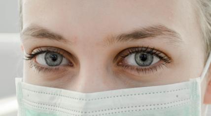 A woman wearing a face mask