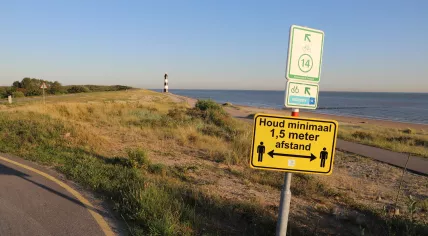 A sign promoting social distancing in Breskens, a village in Sluis, Zeeland. 29 June 2020