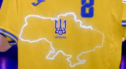 Still image from the unveiling of Ukraine's Euro '20 shirt. It shows a map of Ukraine including the Crimean Peninsula occupied by Russia, and regions in the east occupied by Russian-backed separatist forces