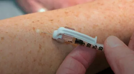 Covid-19 vaccine injected through skin.