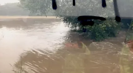High waters in the Kleine Geul waterway approaching the A2 in Meerssen, Limburg. July 15, 2021