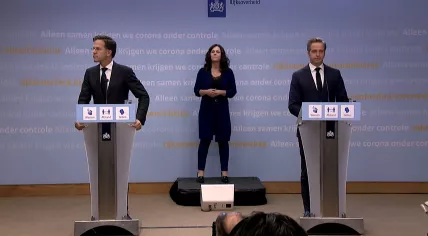 Mark Rutte and Hugo de Jonge at a press conference on 9 July 2021