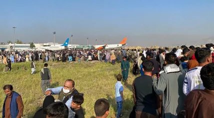 Thousands of people at the airport trying to flee Kabul, Afghanistan after the Taliban took over, 16 August 2021