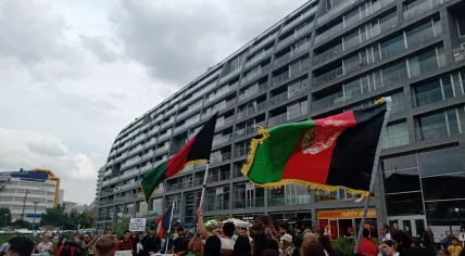 Afghanistan flags wave over an anti-Taliban rally in Rotterdam. August 21, 2021