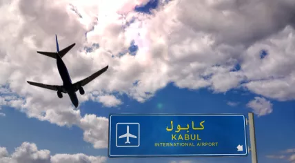 Airplane silhouette landing in Kabul, Afghanistan