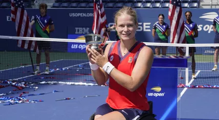 Diede De Groot, of the Netherlands, holds the championship trophy after her victory over Yui Kamiji, of Japan, in the women's wheelchair singles final at the US Open tennis championships, Sunday, Sept. 12, 2021, in New York.