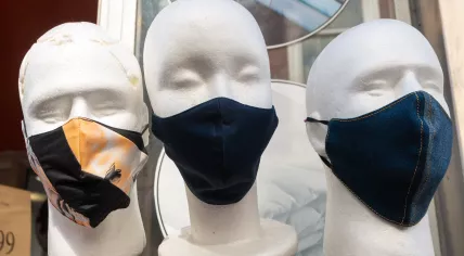 Face masks on mannequin heads in a shop in The Hague. 17 April 2021