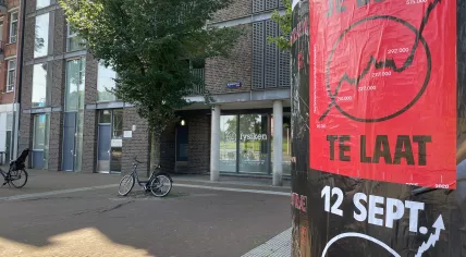 Posters in Amsterdam Oost advertising a housing protest, 6 September 2021