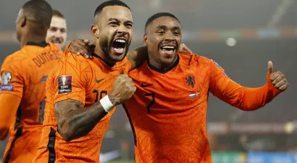 Memphis Depay and Steven Bergwijn celebrate as the Netherlands topped Norway 2-0 in Rotterdam. 16 Nov. 2021