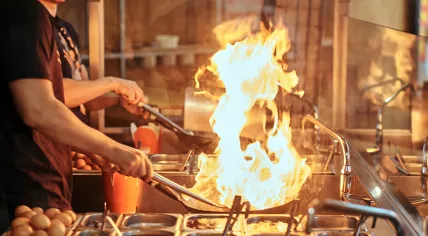 Cooks in a commercial kitchen