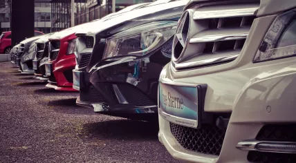 Mercedes Benz parked in a row