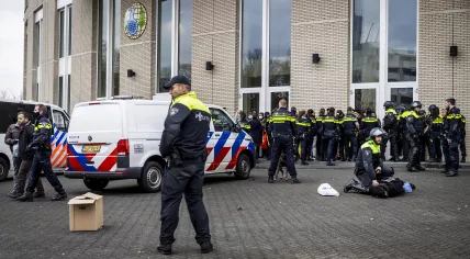 Police arrest protesters who stormed the OPCW building on Johan de Wittlaan in The Hague, 3 December 2021