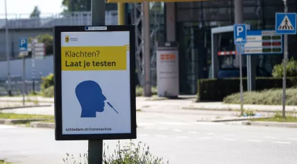 An advertisement calling on people with Covid-19 symptoms to get tested. 30 July 2020
