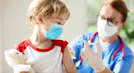 Child getting Covid-19 vaccine