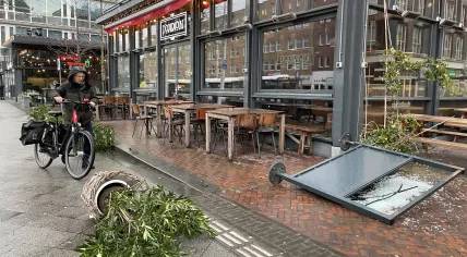 Storm Corrie: Winds whipped through Amsterdam-Oost, knocking over glass signs and potted plants. 31 January 2021
