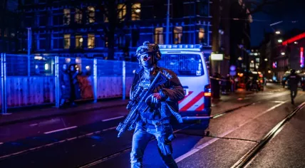 A heavily-armed police officer at the scene of a hostage situation at the Apple Store in Amsterdam. 22 Feb. 2022