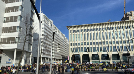 Hundreds of demonstrators gather in front of city hall in The Hague to protest the Russian invasion of Ukraine. 26 Feb. 2022