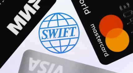 SWIFT logo surrounded by bank cards