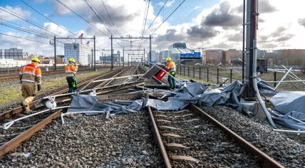 ProRail cleaning debris from storm Eunice off the rails in Amsterdam, 19 February 2022