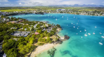 Aerial view of Merville Beach in Mauritius.