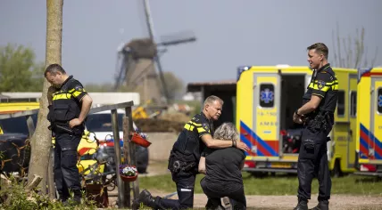 Police at the scene of a double fatal shooting at a care farm on Molensingel in Alblasserdam, 6 May 2022