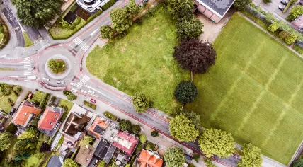 Aerial view of Dutch town with roundabout.