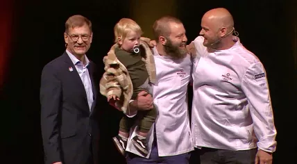 Jos Timmer and his young son accept the first Michelin star for De Kas with Wim de Beer, 30 May 2022