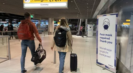 A face mask sign at Schiphol Airport, 24 March 2022