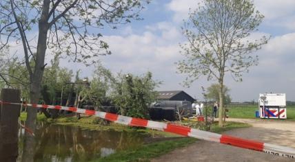 Police at the scene of a double fatal shooting at Tro Tardi care farm on Molensingel in Alblasserdam, 6 May 2022