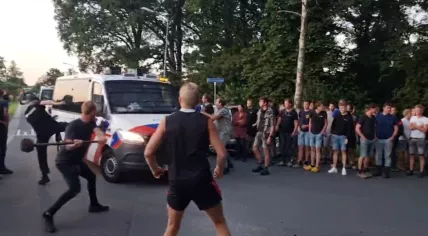 Farmers taking sledgehammers to a police van in Kootwijkerbroek, 28 June 2022