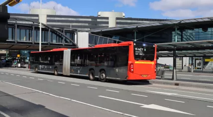 A regional R-Net bus parked at the Schiphol Airport Plaza bus stop. 29 April 2020
