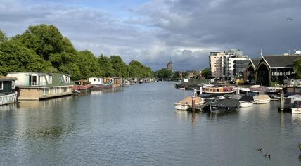 A mix of sun and clouds over the Oostenburgergracht in Amsterdam. 29 May 2022