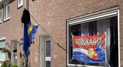 Backpack on top of flag of Curaçao in Zaandam on June 11, 2022. 
