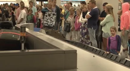 People waiting for their luggage at Schiphol