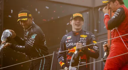 Lewis Hamilton, Max Verstappen, and Charles Leclerc on the podium After the Austrian Grand Prix on the Red Bull Ring. 10 July 2022