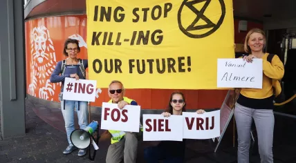 Extinction Rebellion protesting against ING’s fossil fuel investments at a bank branch in Almere. 9 July 2022