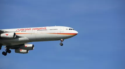 A Surinam Airways Airbus A340-300 on final approach at Schiphol Airport. 19 April 2018
