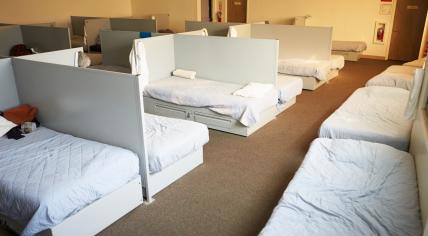 Empty beds in a shelter