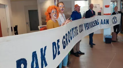 Extinction Rebellion protesting against ING’s fossil fuel investments at a bank branch in Gouda. 9 July 2022