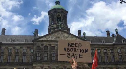 Signs at a protest for abortion rights at Dam Square in Amsterdam on July 2, 2022.