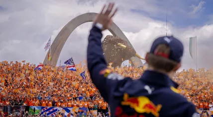 Max Verstappen waves to an orange sea of fans ahead of the Austrian Grand Prix, 10 July 2022
