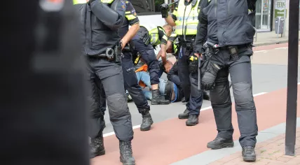 Police move in on group refusing to leave Almelo town hall after farmers protest. 1 Aug. 2022