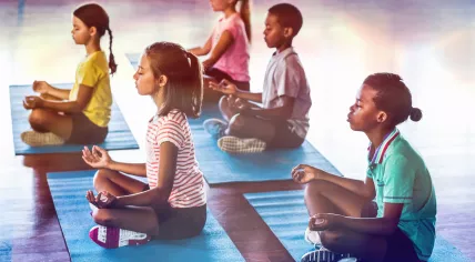 School pupils meditating