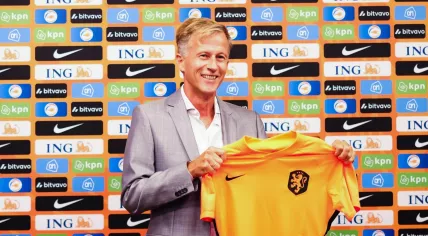 Andries Jonker holding a Oranje Lionesses shirt, 24 August 2022