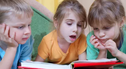 Children reading a book